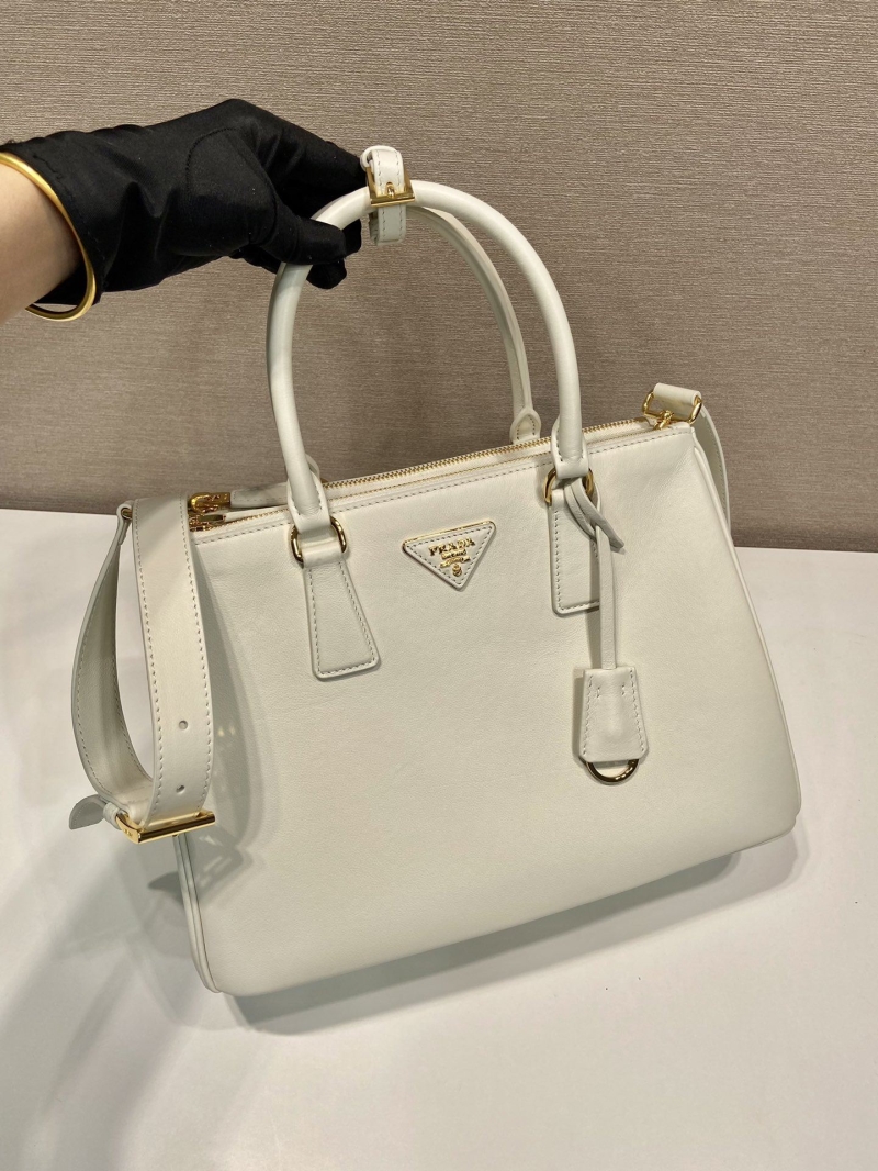 Pra*a top handle bags